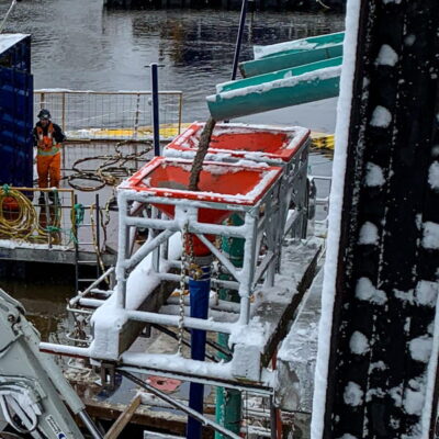 Two SlikTremies with SlikFunnels in action on an underwater concrete pour.